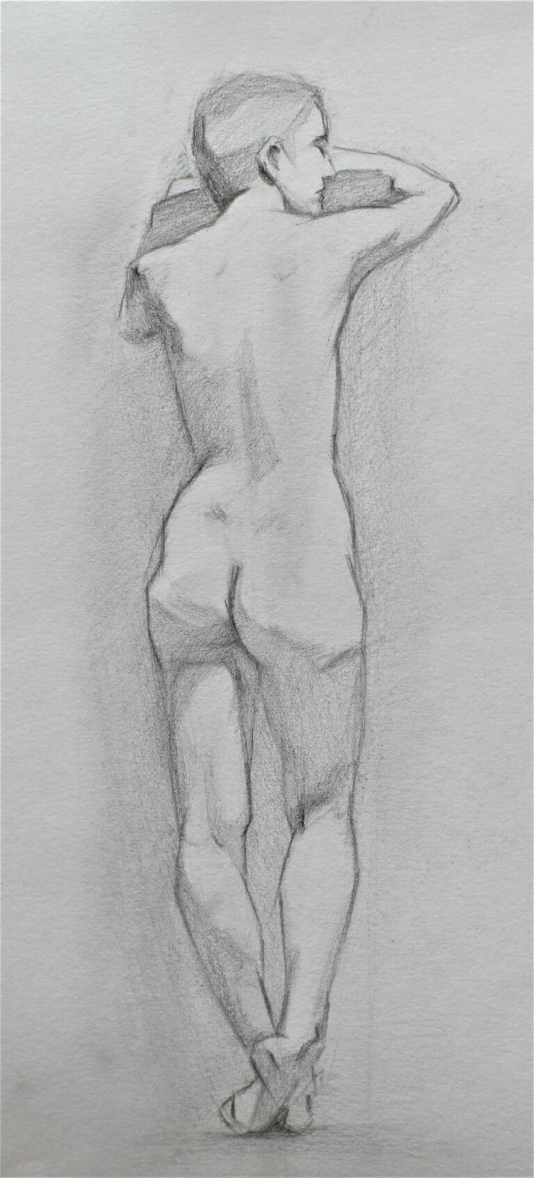 Nude figure pencil drawing seen from the back, studying anatomy and posture from life.